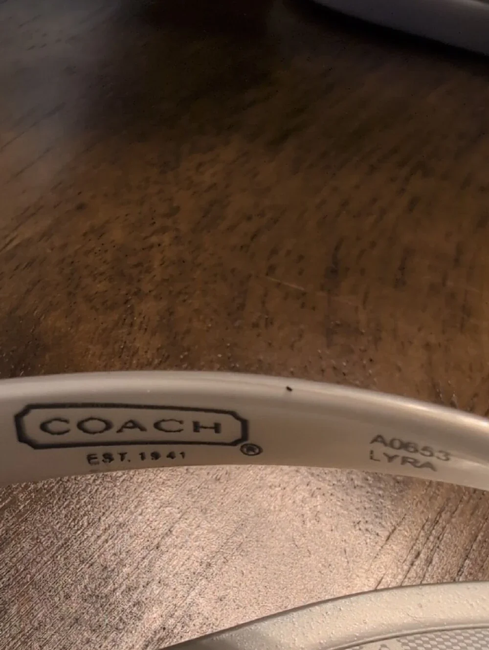 Coach sleek flip